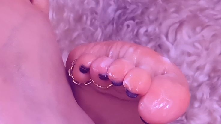 I am counting the soft wrinkles on my feet with my