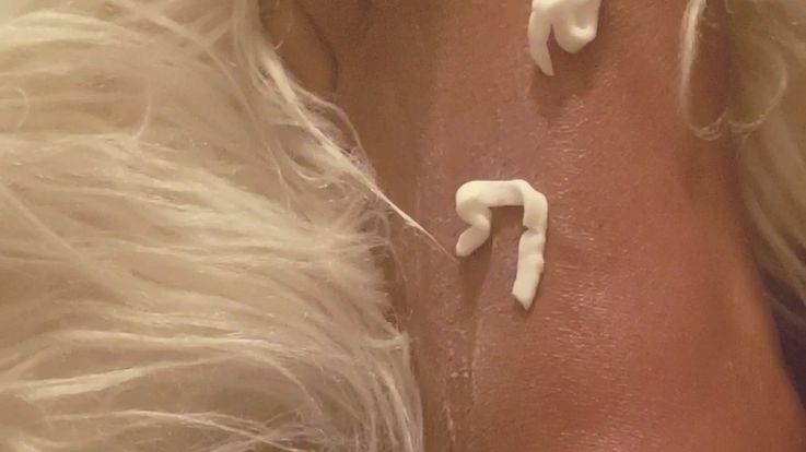 Lotioning up my foot on a furry rug