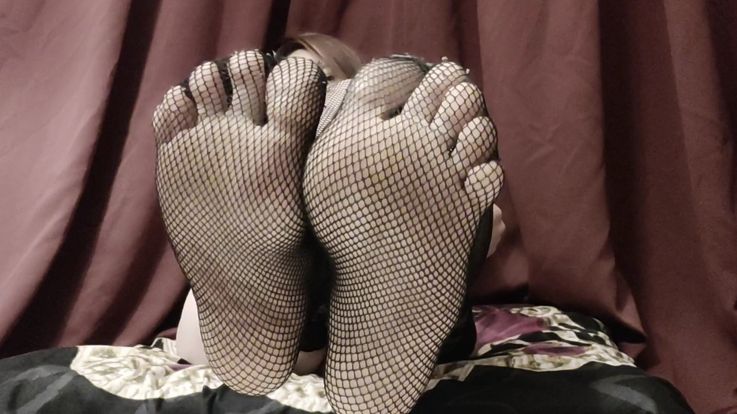 Feets in stockings close up