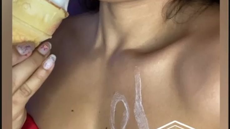 naughty girl plays with her ice cream