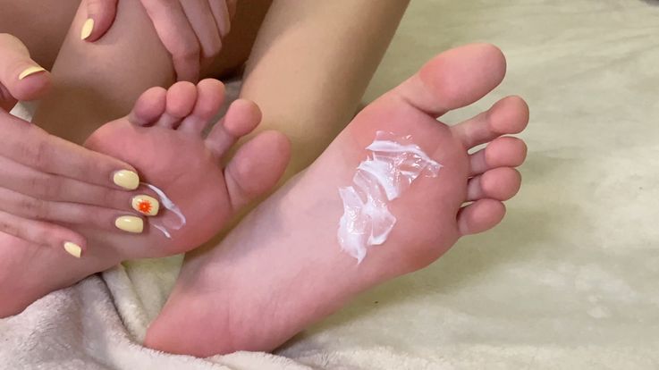 Moisturise feet with cream. Naked