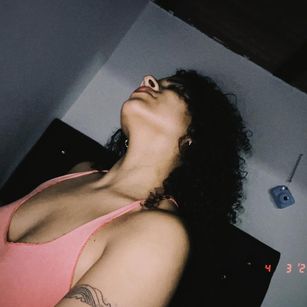 Model - Isis Gil smiling