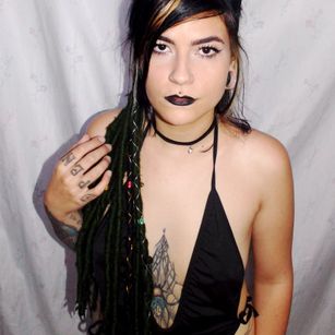 Model - Mina 666 tattoed